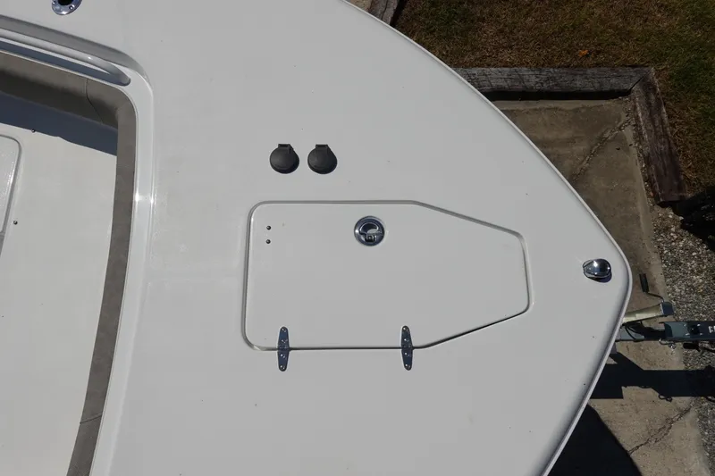 Slide: The Image of Top view of 2026 Sea Hunt Gamefish 27 boat deck with storage hatch. - 29