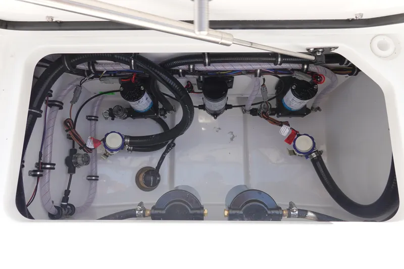 Slide: The Image of 2026 Sea Hunt Gamefish 27 boat wiring and plumbing compartment. - 37