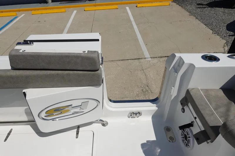 Slide: The Image of 2026 Sea Hunt Gamefish 27 boat interior with seating and cup holders. - 39