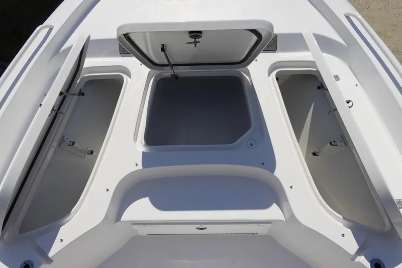Slide: The Image of 2026 Sea Hunt BX 25 FS boat storage compartments open, showcasing spacious design. - 27