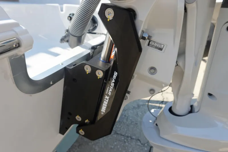 Slide: The Image of 2026 Sea Hunt BX 25 FS boat with hydraulic steering mechanism detail. - 7