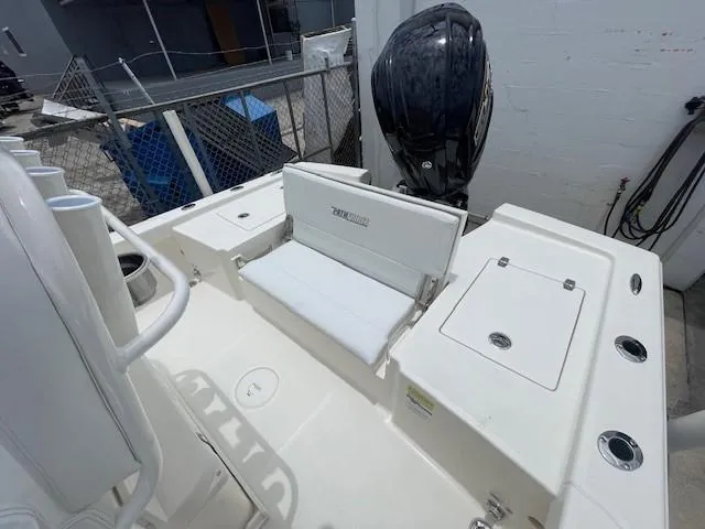 Slide: The Image of 2025 Pathfinder 2200 TRS boat interior with seating and storage compartments. - 10