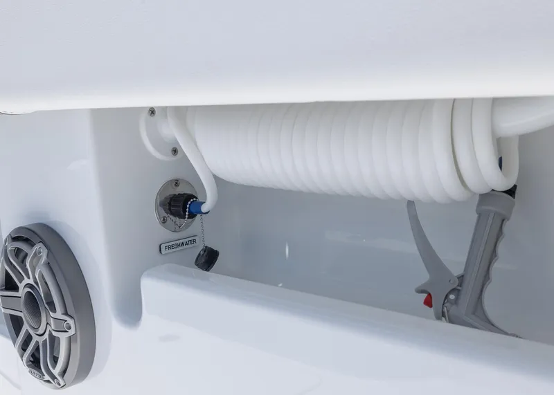 Slide: The Image of Coiled hose and speaker on 2026 Invincible 38 Catamaran. - 18