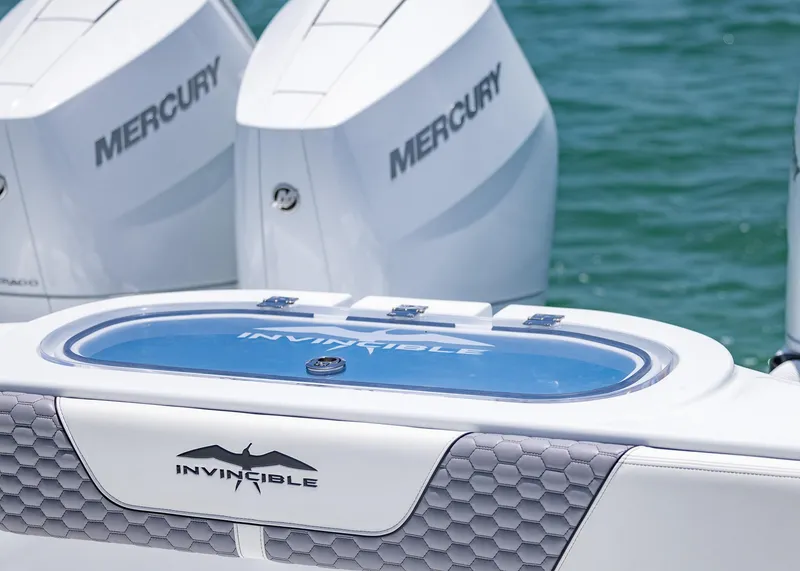 Slide: The Image of 2026 Invincible 38 Catamaran with Mercury engines, featuring sleek design and modern technology. - 35