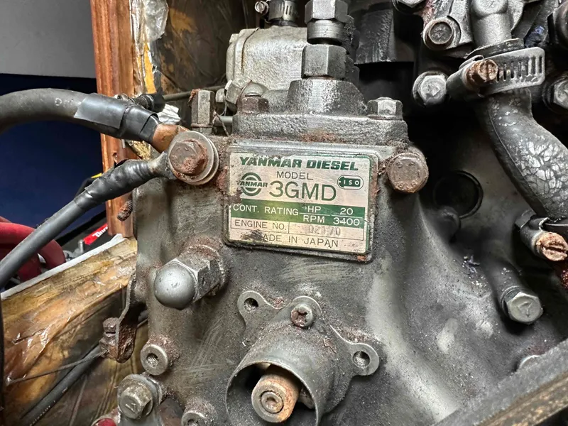 Slide: The Image of Yanmar 3GMD diesel engine in a 1983 racing sloop sailboat. - 16