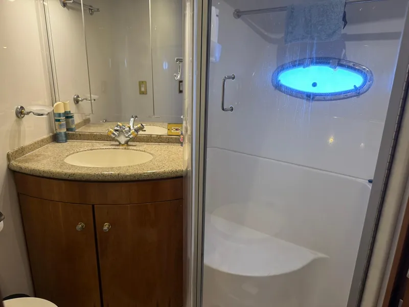 Slide: The Image of Bathroom interior of 2001 Carver 450 Voyager Pilothouse with sink and shower. - 37