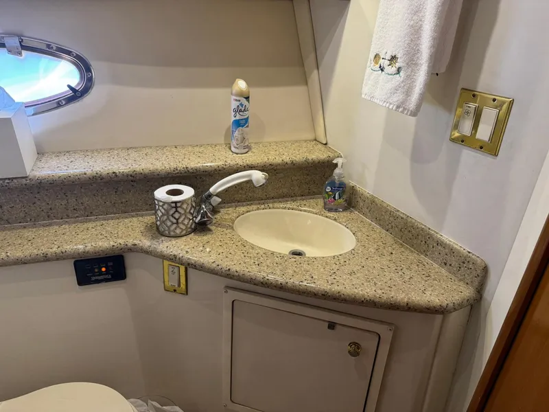 Slide: The Image of Bathroom sink area on a 2001 Carver 450 Voyager Pilothouse yacht. - 42