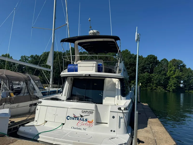 Slide: The Image of 2001 Carver 450 Voyager Pilothouse yacht docked at a marina, Charlotte, NC. - 8