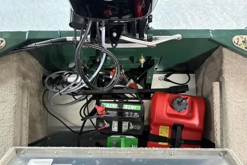 Slide: The Image of 2026 Tracker Bass Tracker® Classic Limited boat interior with battery and fuel tank. - 18