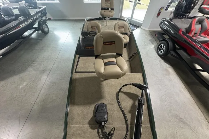 Slide: The Image of 2026 Tracker Bass Tracker® Classic Limited boat interior with seating and equipment. - 19