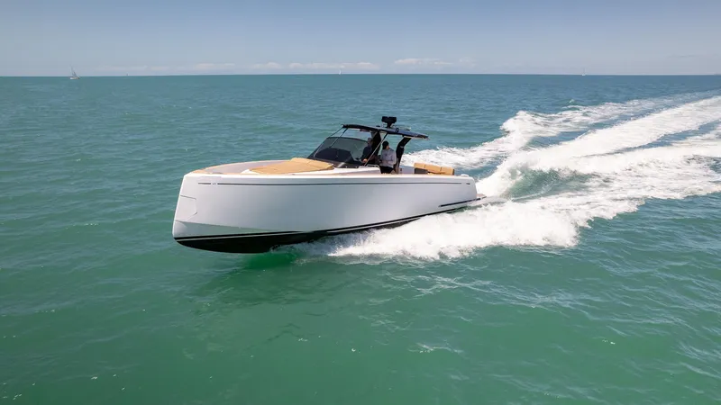 Slide: The Image of 2025 Pardo Yachts 38 cruising on open sea under clear skies. - 11