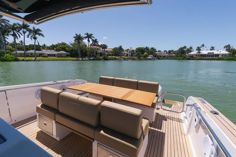 Slide: The Image of Luxury Pardo Yachts 38, 2025 model, with elegant seating and scenic waterfront view. - 13