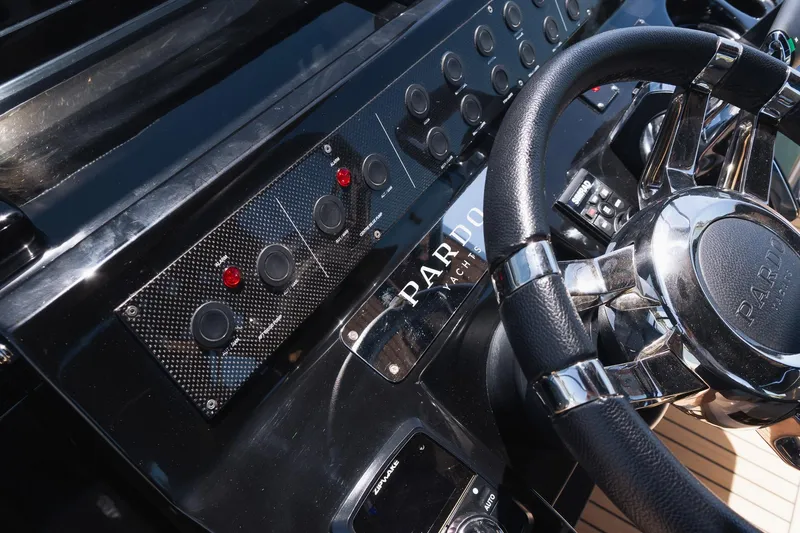 Slide: The Image of Helm of 2025 Pardo Yachts 38 with sleek controls and steering wheel. - 35