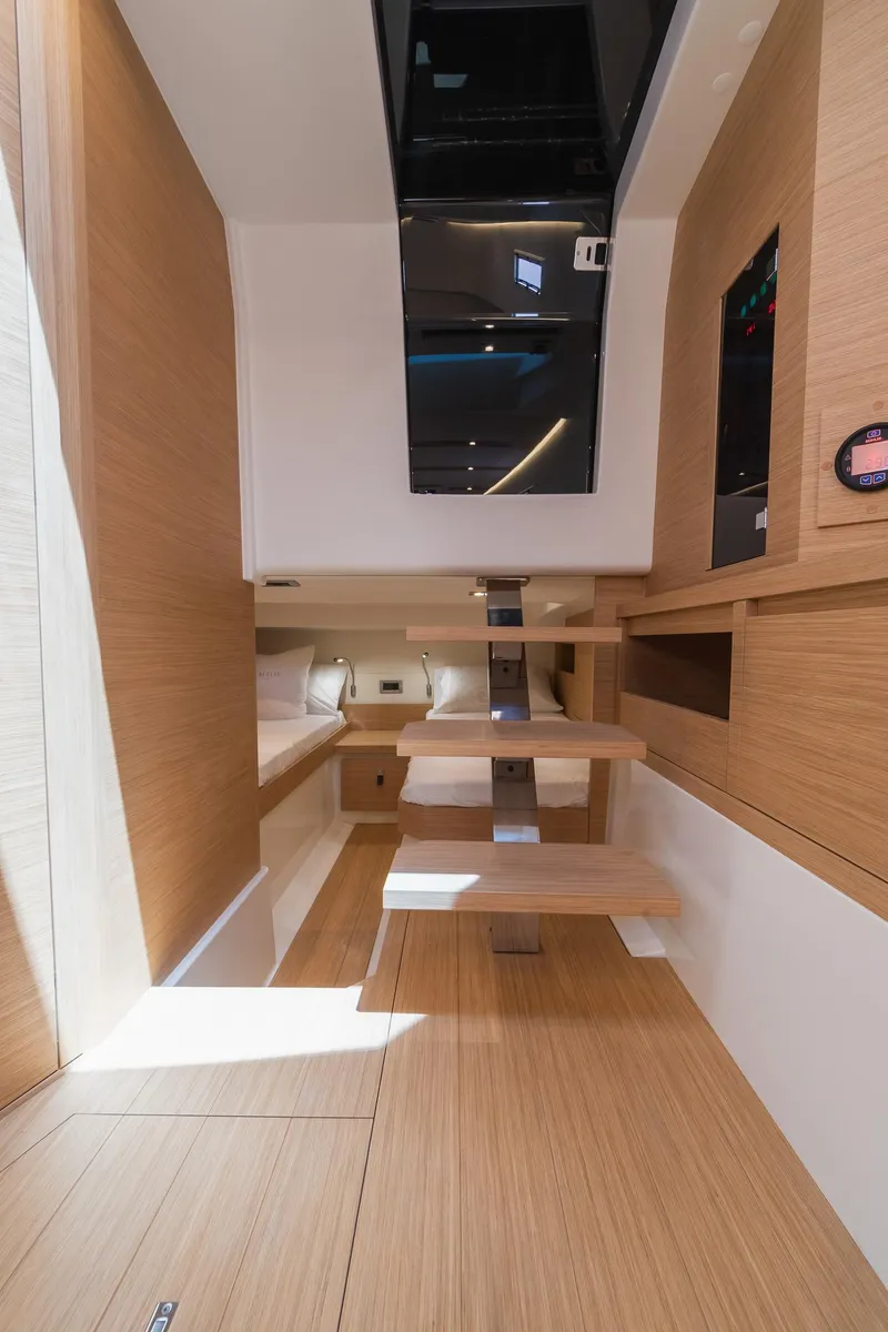 Slide: The Image of Interior of 2025 Pardo Yachts 38, featuring modern wood finishes and sleek design. - 40