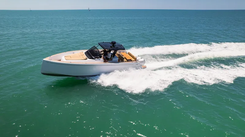 Slide: The Image of 2025 Pardo Yachts 38 cruising on open sea, showcasing sleek design and performance. - 12