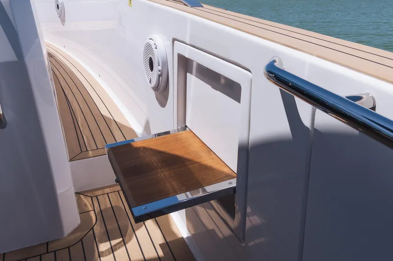 Slide: The Image of Pardo Yachts 38 (2025) deck with fold-out step and sleek design. - 28