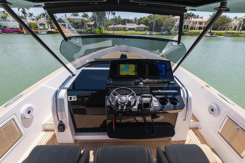 Slide: The Image of Helm of 2025 Pardo Yachts 38, featuring modern navigation equipment and luxurious design. - 36