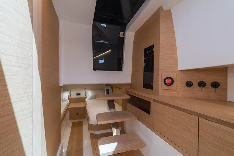 Slide: The Image of 2025 Pardo Yachts 38 interior with modern wood finish and sleek design. - 39