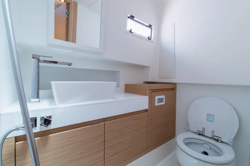 Slide: The Image of Modern bathroom interior on 2025 Pardo Yachts 38, featuring sleek sink and toilet design. - 41