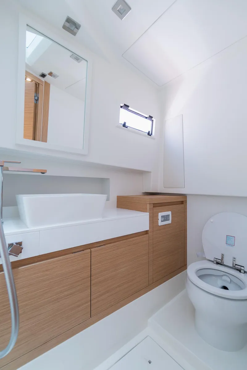 Slide: The Image of Modern bathroom in 2025 Pardo Yachts 38, featuring sleek design and wooden cabinetry. - 43