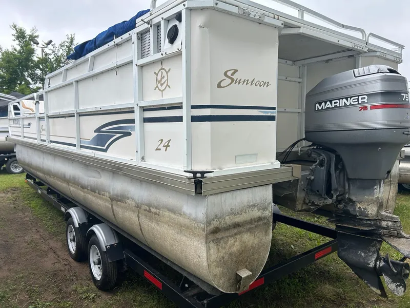 Slide: The Image of 1996 JC Suntoon 24 pontoon boat with Mariner 75 outboard motor on trailer. - 2