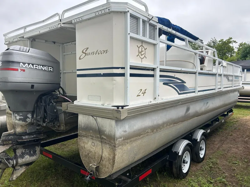 Slide: The Image of 1996 JC Suntoon 24 pontoon boat with Mariner 75 outboard motor on trailer. - 4
