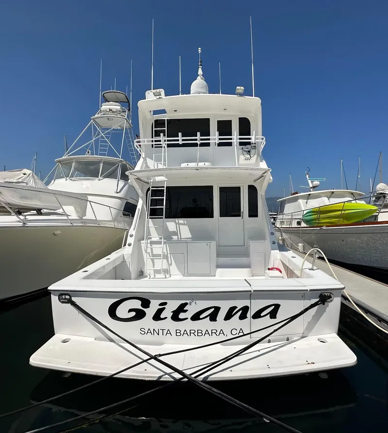 Slide: The Image of 2000 Viking Enclosed Flybridge yacht docked in Santa Barbara marina. - 3