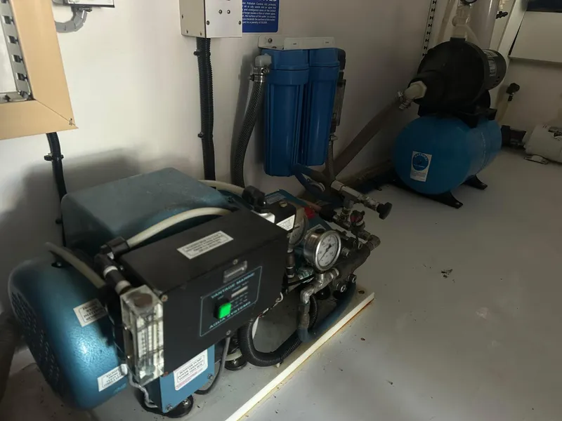 Slide: The Image of Engine room equipment on a 2000 Viking Enclosed Flybridge yacht. - 42