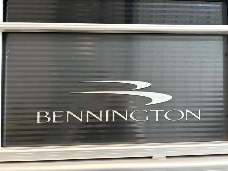 Slide: The Image of Close-up of the Bennington logo on a boat. - 25