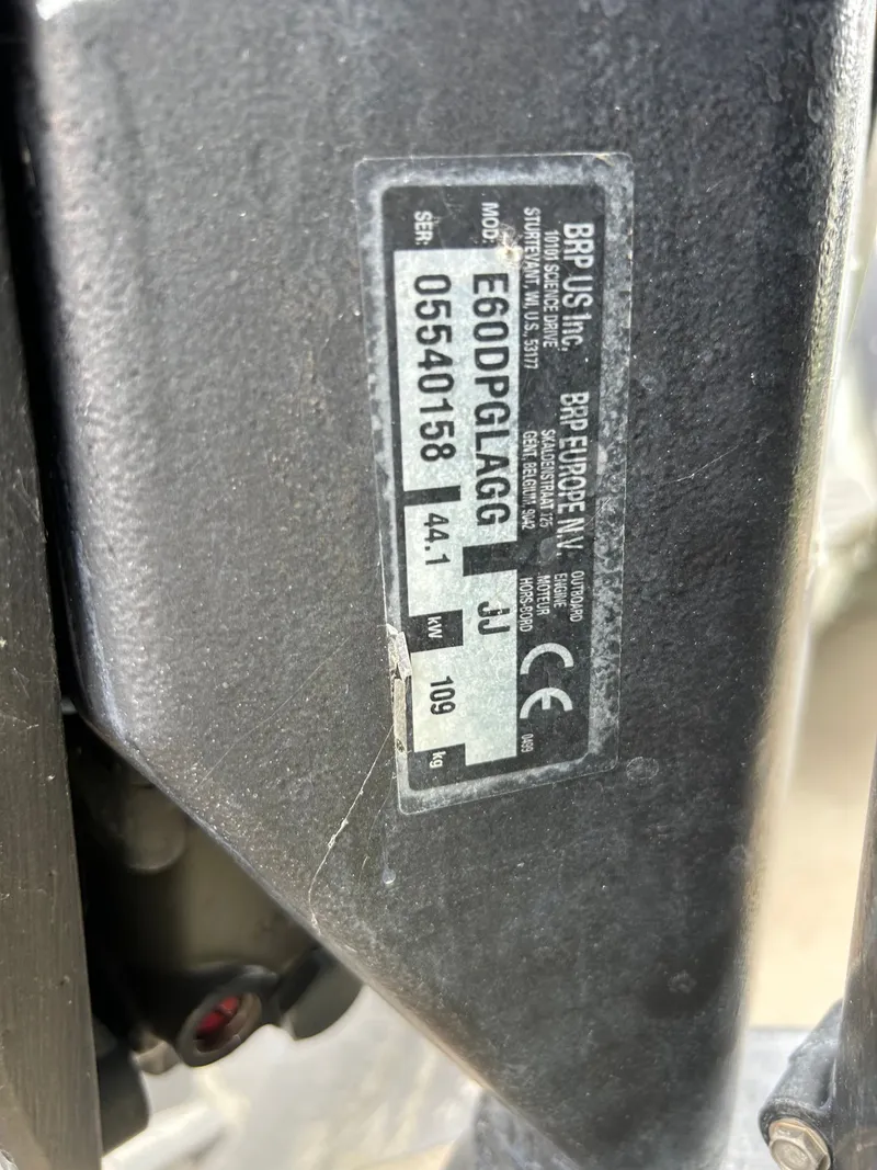 Slide: The Image of Close-up of a boat part with serial number and manufacturer details. - 33