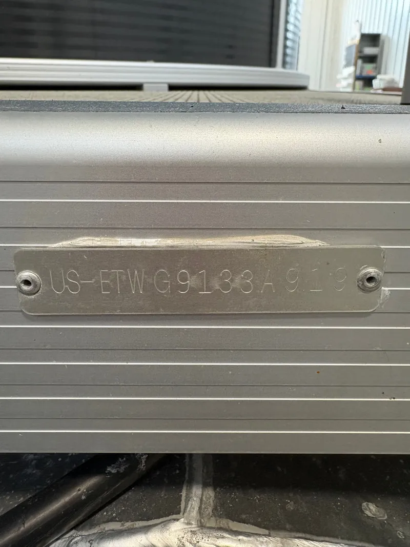 Slide: The Image of Close-up of a serial number on a boat. - 31