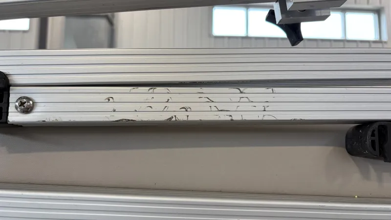 Slide: The Image of Close-up of an aluminum frame with scratches in an interior setting. - 24