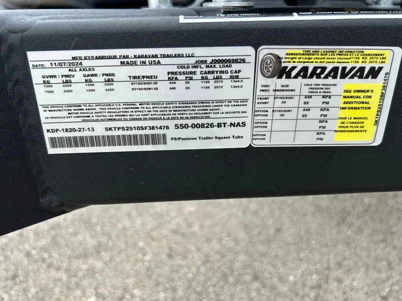 Slide: The Image of A label on a Karavan trailer displays technical specifications and safety information. - 35