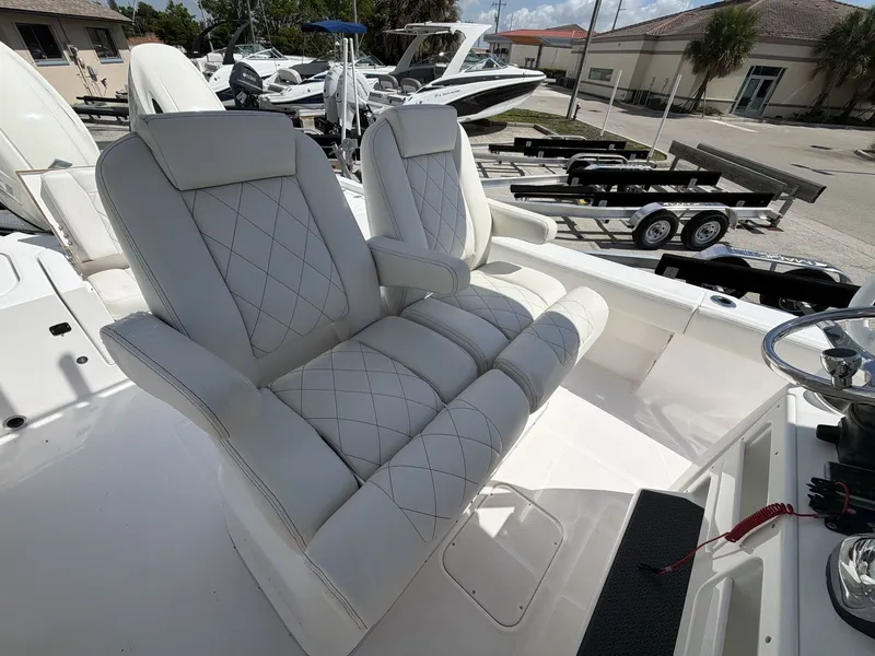 Slide: The Image of Luxurious seating in the 2020 Blue Wave 2800 Makaira boat. - 20