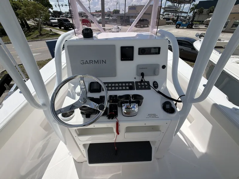 Slide: The Image of 2020 Blue Wave 2800 Makaira helm with Garmin equipment. - 21