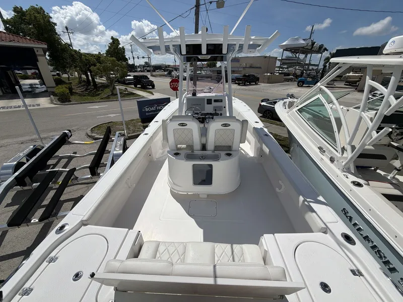 Slide: The Image of 2020 Blue Wave 2800 Makaira boat interior on a sunny day. - 28