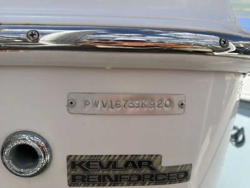 Slide: The Image of Close-up of serial number and Kevlar reinforcement on a Blue Wave 2800 Makaira boat. - 31