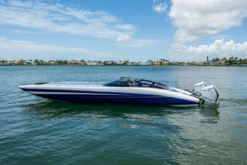 Slide: The Image of 2023 Performance Powerboats P360 on calm water under a clear blue sky. - 19