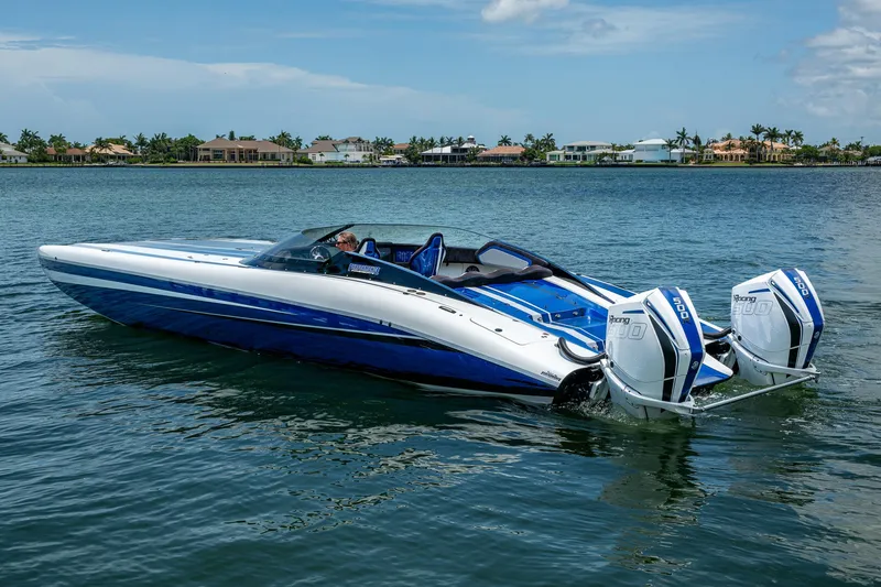 Slide: The Image of 2023 Performance Powerboats P360 on water, featuring dual outboard engines. - 21