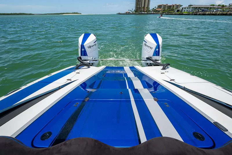 Slide: The Image of 2023 Performance Powerboats P360 on water, featuring dual outboard engines and sleek blue design. - 22