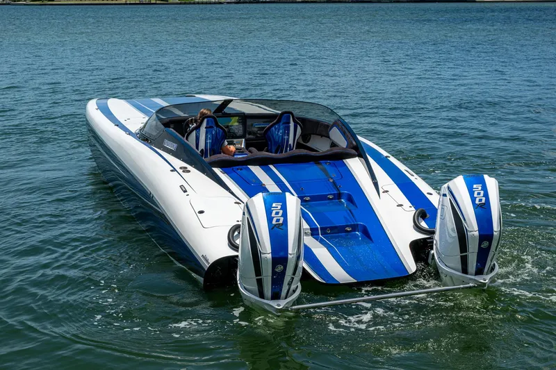 Slide: The Image of 2023 Performance Powerboats P360 on water, featuring dual 500 horsepower engines. - 23