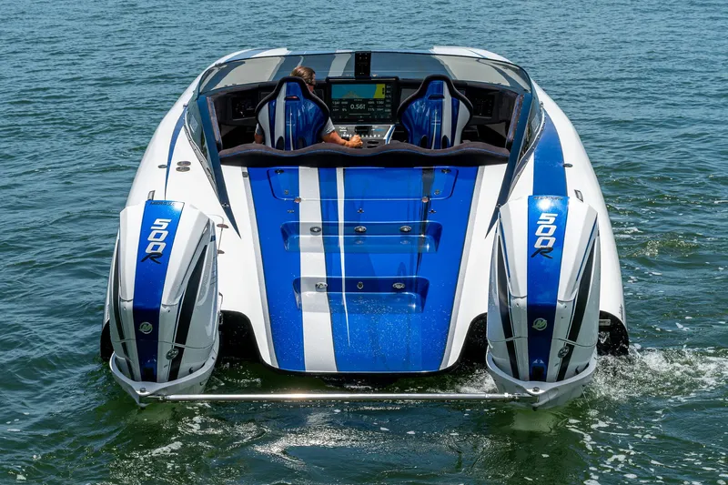 Slide: The Image of 2023 Performance Powerboats P360 on water, featuring dual 500R engines and sleek blue design. - 24