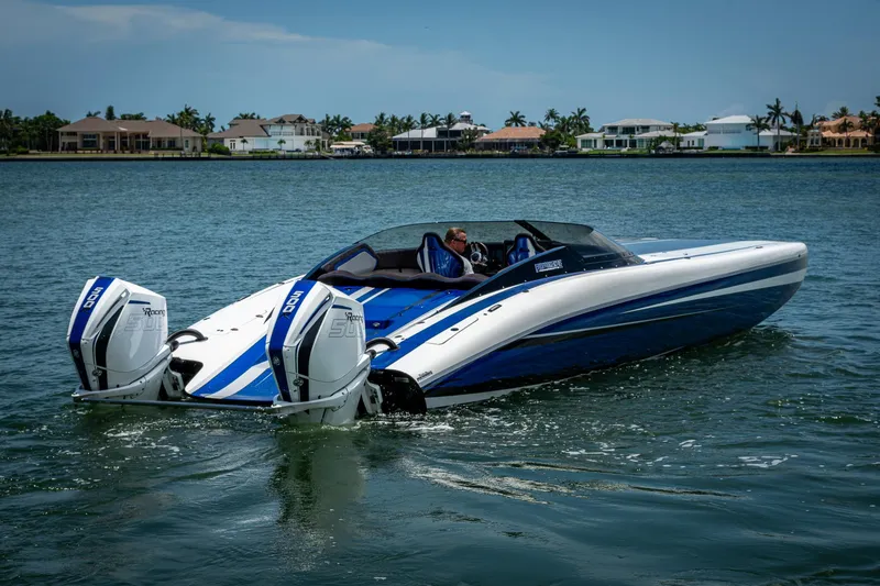 Slide: The Image of 2023 Performance Powerboats P360 on water, featuring dual outboard engines. - 25