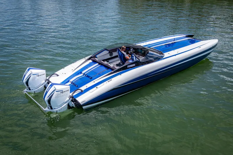 Slide: The Image of 2023 Performance Powerboats P360 on water, featuring sleek design and dual outboard engines. - 34