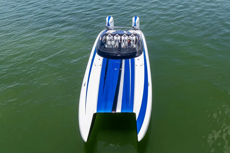Slide: The Image of 2023 Performance Powerboats P360 on water, featuring sleek blue and white design. - 40
