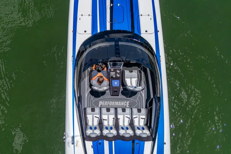 Slide: The Image of 2023 Performance Powerboats P360, aerial view, sleek design on green water. - 45