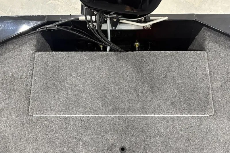 Slide: The Image of 2025 Tracker BASS TRACKER® Classic XL boat interior with gray carpeted flooring. - 21