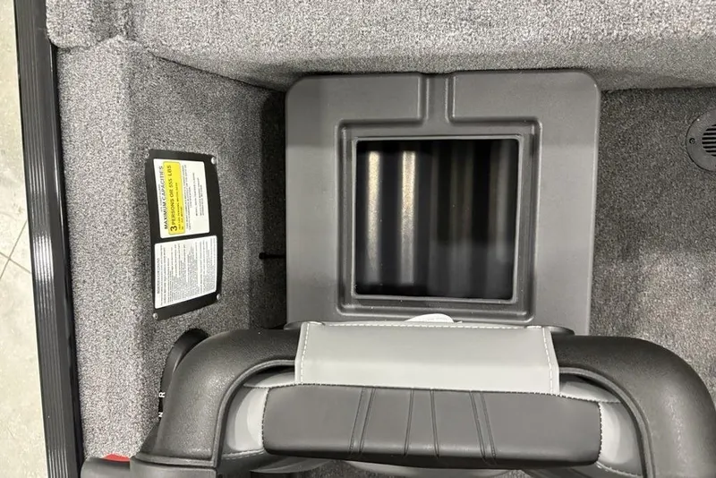 Slide: The Image of 2025 Tracker BASS TRACKER® Classic XL interior storage compartment with warning label. - 22