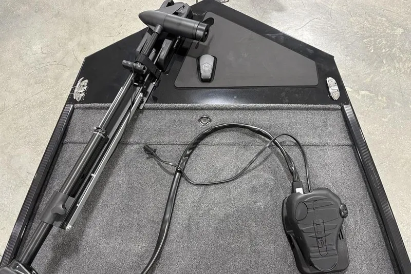 Slide: The Image of 2025 Tracker BASS TRACKER® Classic XL boat deck with trolling motor and foot pedal. - 5