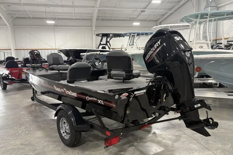 Slide: The Image of 2025 Tracker BASS TRACKER® Classic XL boat with Mercury engine in showroom. - 6